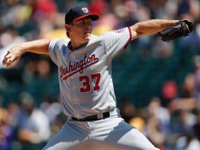 Washington Nationals starter Stephen Strasburg delivers a pitch to Colorado Rockies’ Charlie Blackmon Wednesday, Aug. 17, 2016 in Denver. (AP Photo/David Zalubowski)