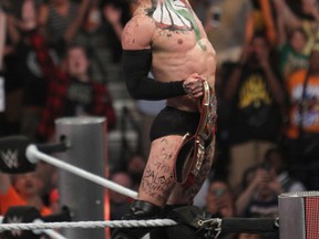 New World Wrestling Entertainment Universal champion Finn Balor celebrates after winning the title at SummerSlam in Brooklyn, N.Y., on Sunday night. (George Tahinos/SLAM! Wrestling)