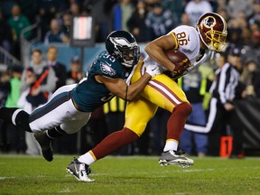 Rob Gronkowski is the No. 1 fantasy tight end. But did you know the Washington Redskins' Jordan Reed (86), here breaking a tackle by Philadelphia Eagles' Mychal Kendricks to score a touchdown, is No. 2? .  (AP Photo/Matt Rourke)