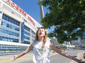 Capri Everett, 11, will complete her 80-country anthem singing tour at the Rogers Centre on Friday. (MICHAEL PEAKE, Toronto Sun)