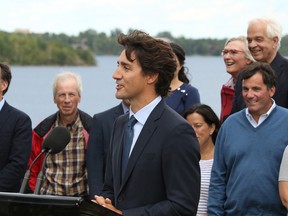 Prime Minister Justin Trudeau is flanked by cabinet colleagues at a  media event on Monday at Lake Ramsey. The ministers bunked together in student dorms at Laurentian University during a two-day cabinet retreat.(Gino Donato/Sudbury Star)
