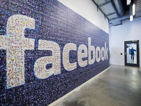 A big logo created from pictures of Facebook users worldwide is pictured in the company's Data Center, its first outside the US in Swedish Lapland.