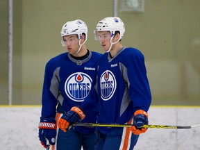 Taylor Hall (left), who was traded to the Devils in the offseason, says Connor McDavid (right) would make a great captain if the Oilers choose to give him the 'C' this season. (Greg Southam/Postmedia Network/Files)