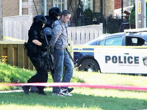 Sarnia police arrested a man Tuesday after a lengthy standoff at a Roger Street address. No one was injured, police say. Tyler Kula/Sarnia Observer/Postmedia Network