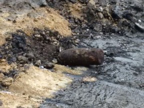 An unexploded artillery shell was found on Mayfair Avenue on Tuesday. (WINNIPEG POLICE SERVICE PHOTO)