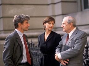 Steven Hill, right, with Sam Waterston and Carey Lowell in “Law and Order.” (NBC)