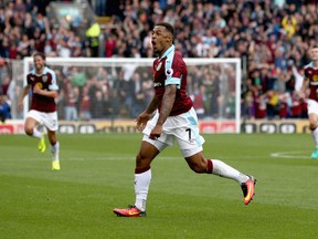 Andre Gray of Burnley celebrates scoring his team's second goal during a Premier League match against Liverpool in Burnley, England, on Aug. 20, 2016. (Jan Kruger/Getty Images)