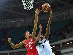 Canada's power forward Miranda Ayim (L) and France's centre Sandrine Gruda go for a rebound during a Women's quarterfinal basketball match between France and Canada at the Carioca Arena 1 in Rio de Janeiro on August 16, 2016 during the Rio 2016 Olympic Games. (ANDREJ ISAKOVIC/AFP/Getty Images)