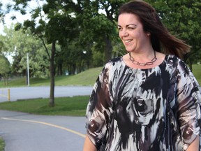 Samantha Reed/The Intelligencer
Christie Perry, a board member of the Kingston chapter of the Kidney Foundation of Canada, walks along the water at Zwicks Park Monday afternoon. In a few short weeks, Perry will be walking with local residents down the same path for this year's Belleville Kidney Walk. The event raises funds for  research and patient programs for those suffering from kidney diseases.