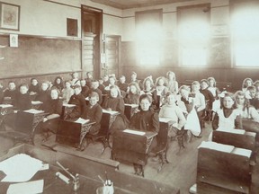 Students sitting in a classroom at Frontenac Public School on Cowdy in 1902. (Supplied photo)