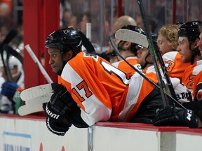 Wayne Simmonds of the Philadelphia Flyers looks on from the bench with teammates against the Toronto Maple Leafs on April 7, 2016 at the Wells Fargo Center in Philadelphia. (Len Redkoles/NHLI via Getty Images)