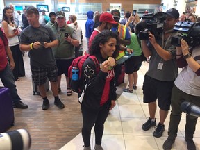 Winnipegger Desiree Scott arrived at Richardson International Airport on Aug. 23, 2016, following a bronze medal win at the Rio Olympics in women's soccer. (JIM BENDER/WINNIPEG SUN/POSTMEDIA NETWORK)