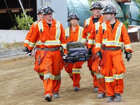The Vale Sudbury West Mines prepare to participate in the First Aid Competition during International Mine Rescue Competition in Sudbury, Ont. on Tuesday August 23, 2016. Gino Donato/Sudbury Star/Postmedia Network