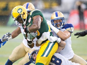 The play of Eskimos CB Patrick Watkins, shown here against the Blue Bombers in July, has picked up in recent weeks as he has become more comfortable with the system of defensive co-ordinator Mike Benevides. (The Canadian Press)