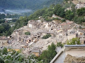 A view of the collapsed buildings of the town of Pescara del Tronto, Italy, after an earthquake, Aug. 24, 2016. (Cristiano Chiodi/ANSA via AP)