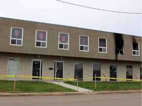 Police tape closes off a building at the corner of Manning Avenue and King Street on August 22, 2016. The night before, firefighters responded to a blaze in a top-floor room.