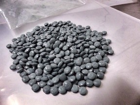 Fentanyl pills are shown in an undated police handout photo. (THE CANADIAN PRESS)