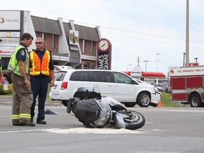 Greater Sudbury Police and Fire services are on the scene of a collision between a van and motorcycle in Sudbury, Ont. on Wednesday August 24, 2016. Regent street is closed in both directions at Deluxe Hamburgers until the investigation is complete. Gino Donato/Sudbury Star/Postmedia Network