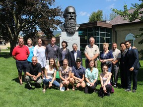 Oxford hosted a number of Taiwanese visitors on Wednesday, Aug. 24. The group - including Oxford County politicians and staff as well as WCI students who will take part in an exchange to Taipei, Taiwan next year - did a walking tour of downtown Woodstock, stopping at the bust of George Leslie Mackay. (MEGAN STACEY/Sentinel-Review)