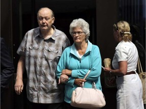 Donald Greenham, 73, leaves the Ottawa courthouse with his wife on Aug. 24, 2016. DAVID KAWAI / POSTMEDIA