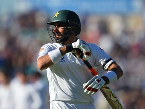 Pakistan’s Misbah-ul-Haq leaves the field after getting out on the second day of the fourth test cricket match between England and Pakistan earlier this month. (GETTY IMAGES)