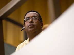 Keith Charles, who operates unregulated group homes through People Helping People, listens as a former tenant of his addresses the Community and Protective Services Committee on Tuesday August 23, 2016. (CRAIG GLOVER, The London Free Press)