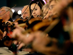 Martha Pitre and the New Brunswick Fiddlers perform at West Edmonton Mall, in Edmonton on Wednesday Aug. 24, 2016. The Canadian Grand Masters Fiddling Competition is being held in Morinville on August 26 and 27, 2016. DAVID BLOOM / Postmedia