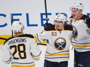 Tyler Ennis, No. 63, celebrates a goal last season with teammates. (The Canadian Press)