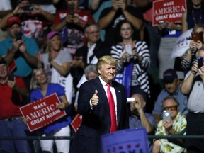 Republican Presidential nominee Donald Trump gives a thumbs up to the crowd at a rally at the Mississippi Coliseum on August 24, 2016 in Jackson, Mississippi. Thousands attended to listen to Trump's address in the traditionally conservative state of Mississippi. (Photo by Jonathan Bachman/Getty Images)