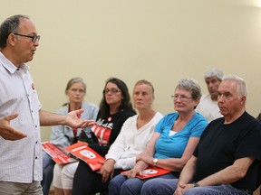 Rosario Marchese, chair of the advisory committee of Hydro One Not For Sale makes a point at a meeting in Sudbury, Ont. on Wednesday August 24, 2016. Gino Donato/Sudbury Star/Postmedia Network