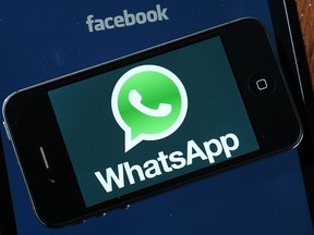 Facebook and WhatsApp logos are displayed on portable electronic devices on February 19, 2014 in San Francisco City.   (Photo Illustration by Justin Sullivan/Getty Images)