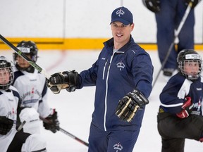Penguins captain Sidney Crosby runs a drill at his hockey camp at Cole Harbour Place in Cole Harbour, N.S., in this July 11, 2016 file photo. (Andrew Vaughan/THE CANADIAN PRESS)
