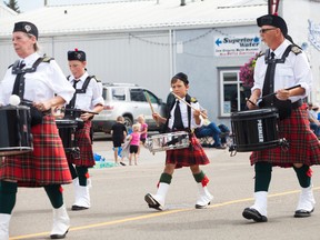 Seven-year-old Drew Rowan marches in the 110th annual Vermilion Fair Parade on Thursday, July 28, marking his first parade with the Lakeland Pipe and Drum Band. Taylor Hermiston/Vermilion Standard/Postmedia Network.