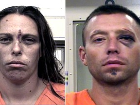 These Aug. 25, 2016 booking photos provided by the Metropolitan Detention Center show Michelle Martens, left and Fabian Gonzales. New Mexico Gov. Susana Martinez says what happened to the little girl "is unspeakable and justice should come down like a hammer" on whoever is responsible. (Metropolitan Detention Center via AP)