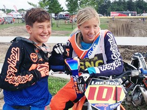 Dara Landon, right, is supported by her brother, Djuro, during pre-staging before one of her races at the Parts Canada TransCan Canadian championships in Walton. Dara was one of 14 racers – and one of two from Sarnia-Lambton – who comprised the first all-girls under-16 class at the national event Aug. 17-21. Handout/Sarnia Observer/Postmedia Network