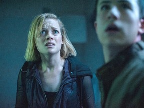 This image released by Sony Pictures shows Jane Levy, left, and Dylan Minnette in a scene from "Don't Breathe."
