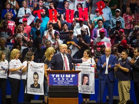 Republican presidential candidate Donald Trump brings border patrol members as well as mothers whose sons had been killed by immigrants to the stage during a rally at the Travis County Exposition Center on August 23, 2016 in Austin, Texas. (Drew Anthony Smith/Getty Images)