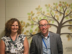 Dr. Gordon Boyd and Susan Warr, seen on Thursday with the donor memorial at Kingston General Hospital, are on the front lines of the organ and tissue donation process. (Victoria Gibson/For The Whig Standard)