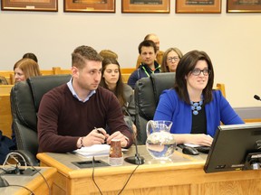 Tom Baby, left, the chair of the local organizing committee for sponsoring a refugee family into Timmins, said all the preparations have been made to bring refugees to Timmins, but the system is stalled at the federal level. Baby, and committee member Carly Stringer, addressed city council on their effort last Dec. 14, as depicted in this file photo.