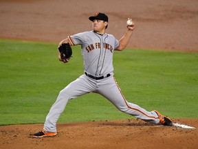 San Francisco Giants starting pitcher Matt Moore throws during the first inning of a baseball game against the Los Angeles Dodgers, Thursday, Aug. 25, 2016, in Los Angeles. (AP Photo/Mark J. Terrill)