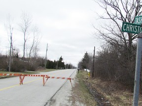 Barricades were up on Tashmoo Avenue, from Christopher Street to LaSalle Line, on Saturday March 26, 2016 on the Aamjiwnaang First Nation at Sarnia. The body of Jonathan Patrick Pike, 26, of Sarnia was found the previous day in a wooden area west of Tashmoo Avenue. A third person sought in the murder investigation was arrested this week in Kitchener.
File photo/Sarnia Observer/Postmedia Network