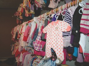 The Parkland Pregnancy Support Centre has a variety of baby clothes for girls and boys. It has seen an increase in the need due to the economic downturn. - Photo by Marcia Love