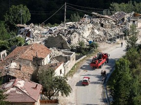 View of damages in a street of Pescara del Tronto, a central Italian village near Amatrice, after a 6.2-magnitude earthquake struck the region. (AFP PHOTO/MARIO LAPORTAMARIO LAPORTA/Getty Images)