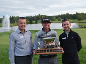 Champion Dustin Risdon between EPGCC general manager Grant Cammidge and coure pro Kyle Boyd.  -Photo courtesy of PGA of Alberta