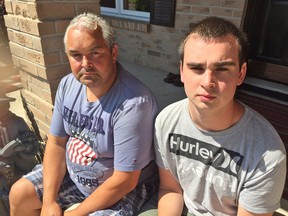 Gerry Lyons and his son, Gerry, at their home in Kingston on Friday. (Paul Schliesmann/The Whig-Standard)