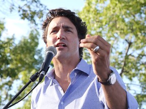 Prime Minister Justin Trudeau addresses the crowd at a community barbecue in Sudbury, Ont. on Monday August 22, 2016. (Gino Donato/Postmedia Network)