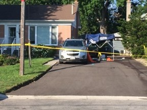 A look Friday at the Scarborough home where three people were killed this week. (CHRIS DOUCETTE, Toronto Sun)