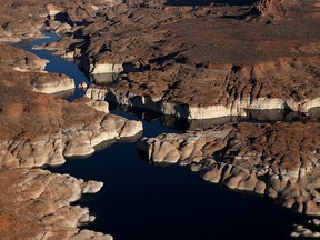 A bleached 'bathtub ring' is visible on the rocky banks of Lake Powell on March 28, 2015 in Lake Powell, Utah. (Photo by Justin Sullivan/Getty Images)