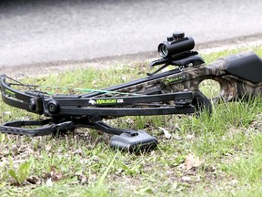 Calgary police arreste a man in 2014 who allegedly had a crossbow on a bus and was aiming it out the windows at people. (POSTMEDIA NETWORK)