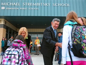 Past Edmonton Public Schools superintendent Michael Strembitsky greet students at the new K-9 school named after him as it opens to students for the first time in September 2012. FILE PHOTO
